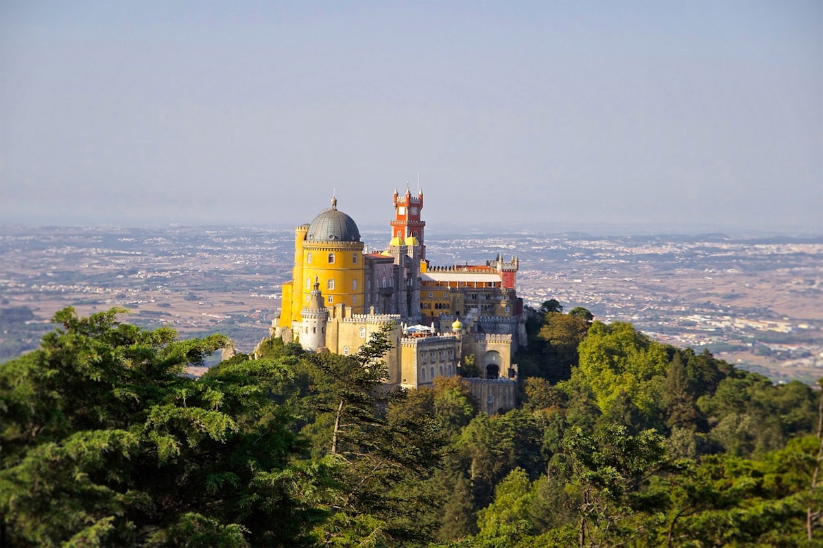 Whitewashed houses and castle walls of Óbidos medieval town